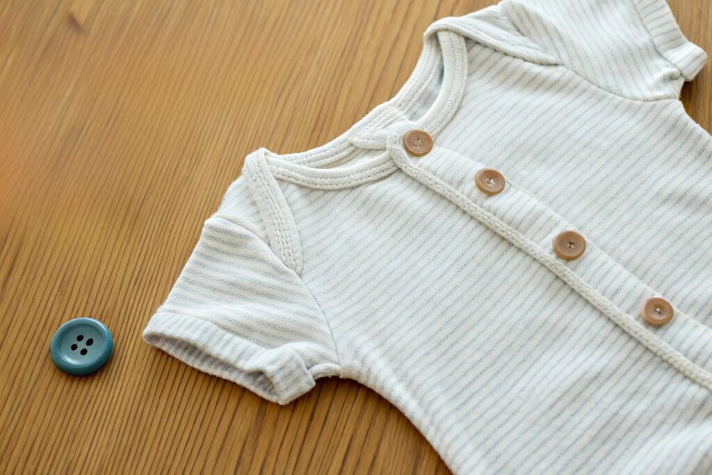 baby onesie with buttons and button on the side, simple design for babies