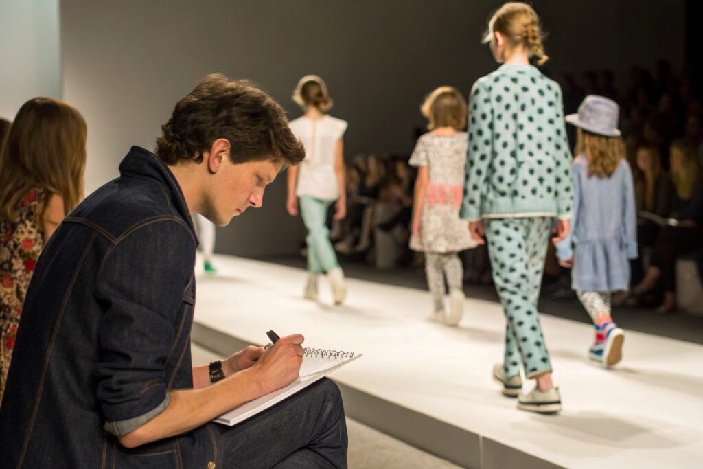 Kidswear designer attending a children’s fashion runway show