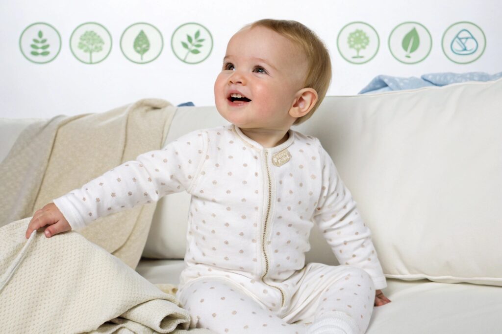 Baby happily wearing a certified organic cotton onesie