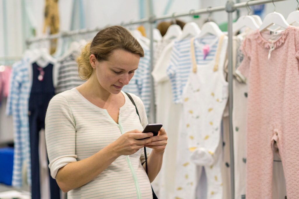 Buyer using the Canton Fair app to navigate through the exhibition