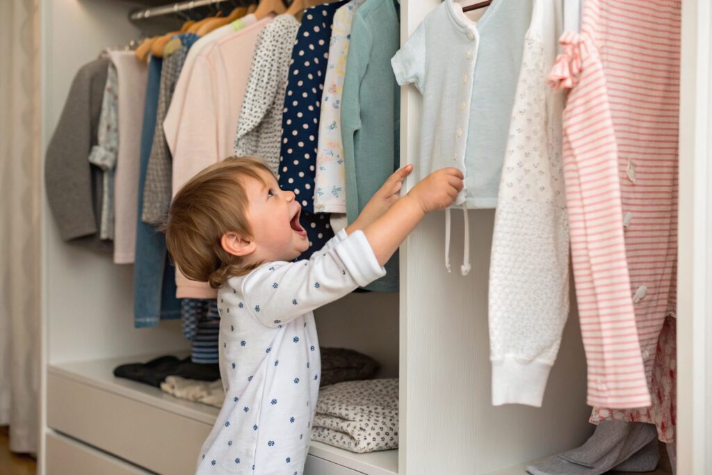 European Child Excitedly Picking Out Their Outfit