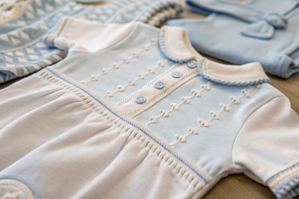 Close-up of a babywear item showing fine detail