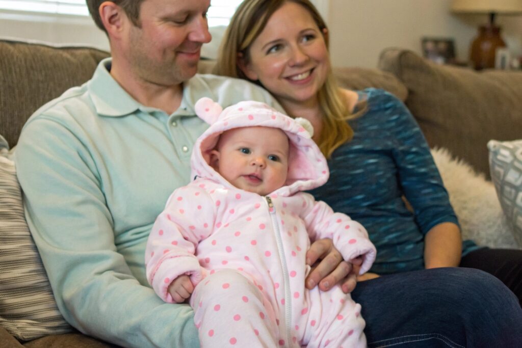 Micro-influencer parent sharing a picture of their baby in adorable outfit