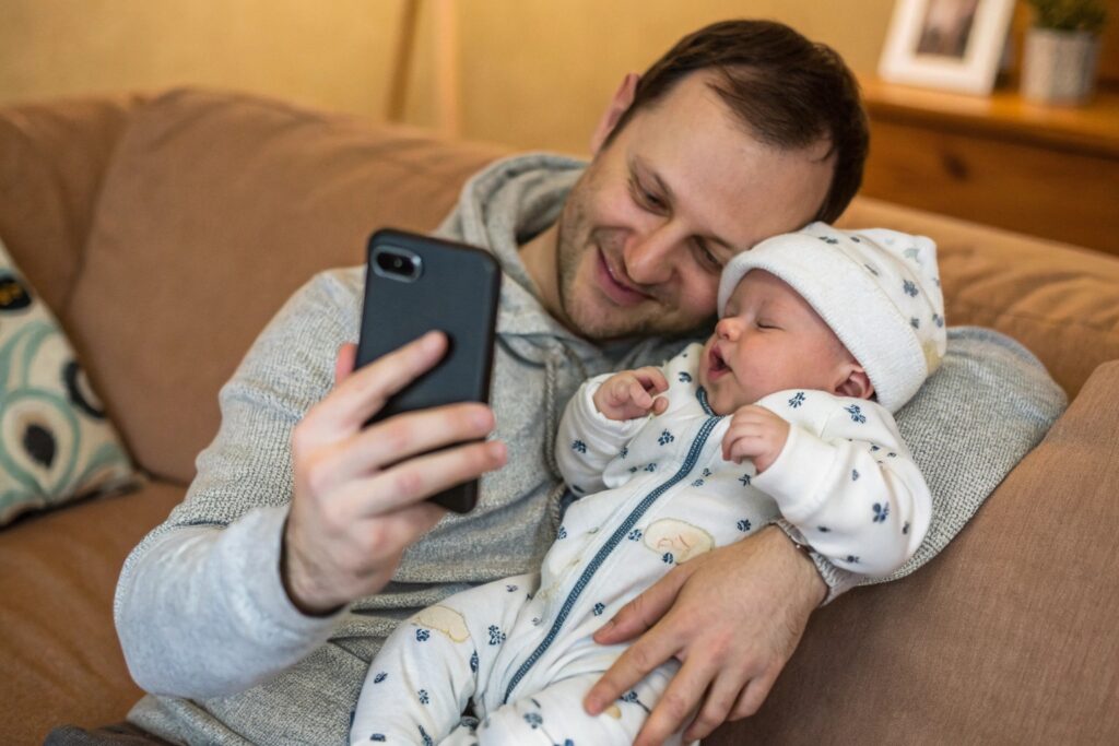 European Parent Sharing a Photo