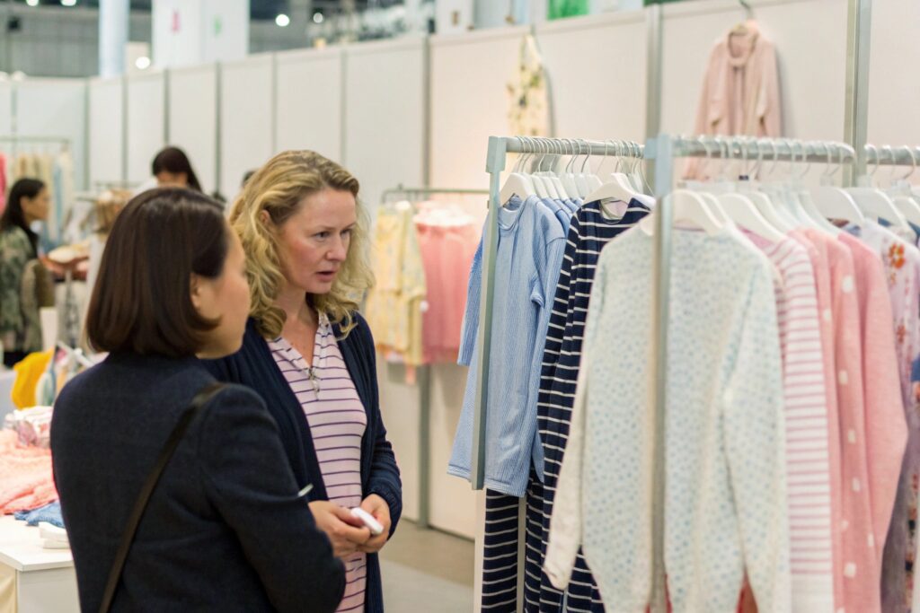 A well-organized and busy children's clothing trade fair