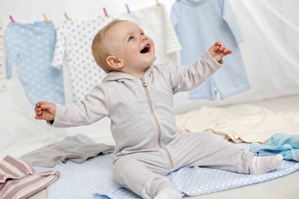 Baby playing happily while wearing comfortable babywear