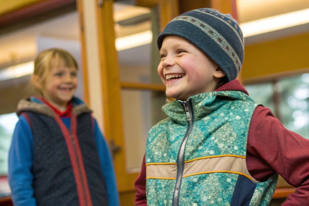 Child happily wearing colorful winter wear