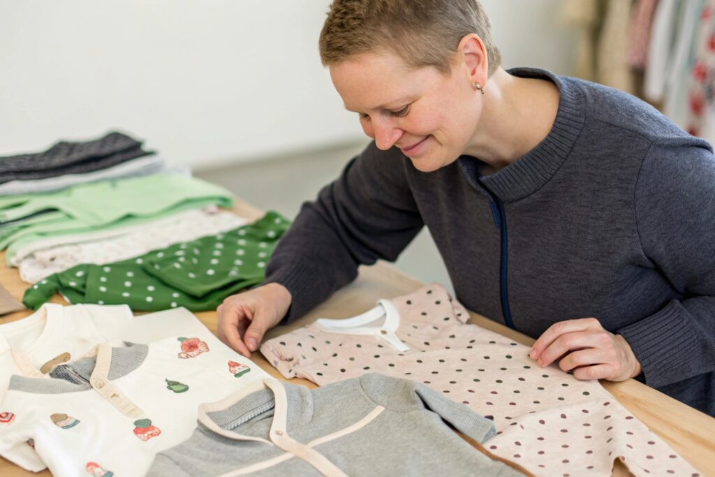 Parent reading certification on sustainable baby clothes