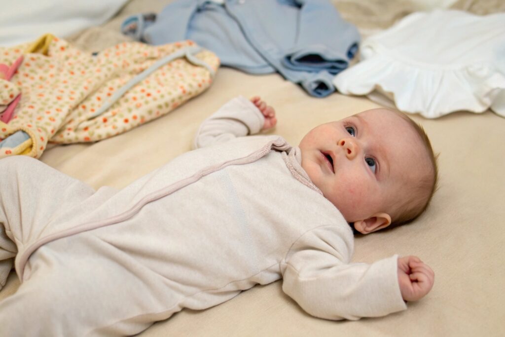 Baby wearing cozy oversized babywear