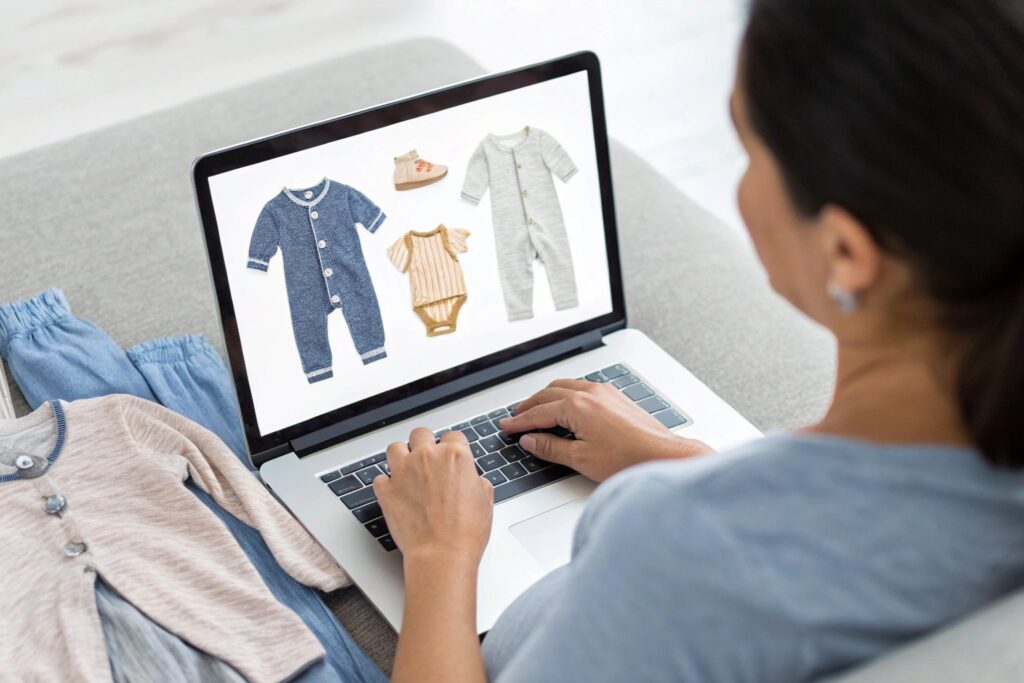 Parent browsing babywear collection online